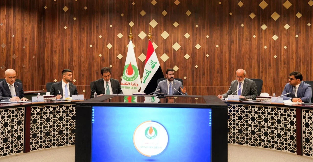 Iraqi Prime Minister Ali Falih Al-Zaidi, center, chairs a meeting at the Ministry of Oil headquarters in Baghdad