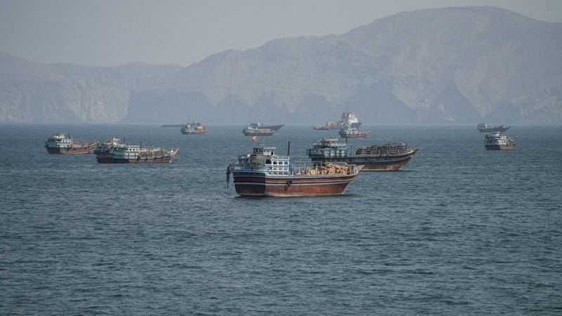 Boats at anchor in the waters of the Strait of Hormuz