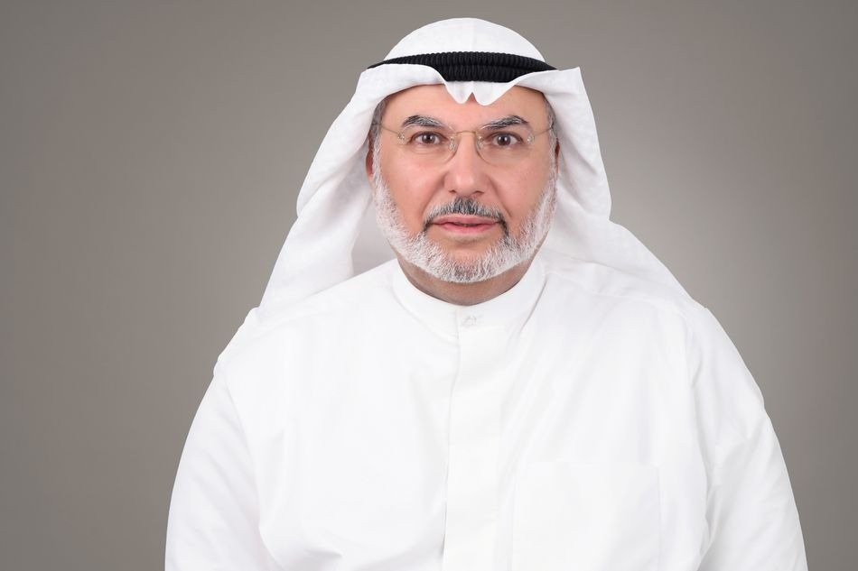 Portrait of Boubyan Bank Chairman Abdulaziz Al-Shaya in a white dishdasha and ghutra