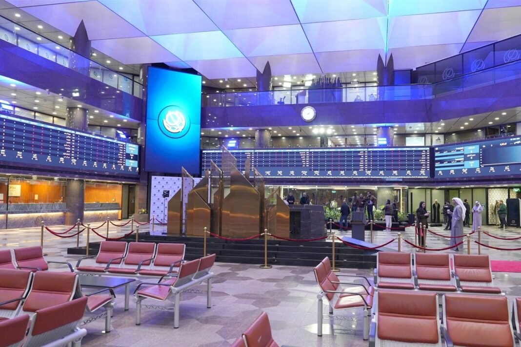 The trading hall of Boursa Kuwait with price boards and visitor seating