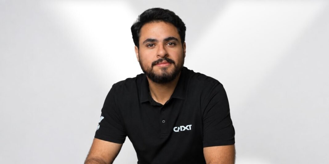 CNTXT AI chief executive Mohammad Abu Sheikh in a black company polo shirt against a light gray background