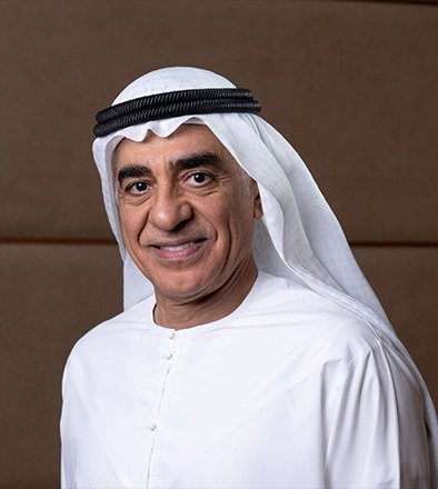 Portrait of Fadhel Abdulbaqi Alali, chairman of Dubai Islamic Bank, wearing a white kandura and ghutra