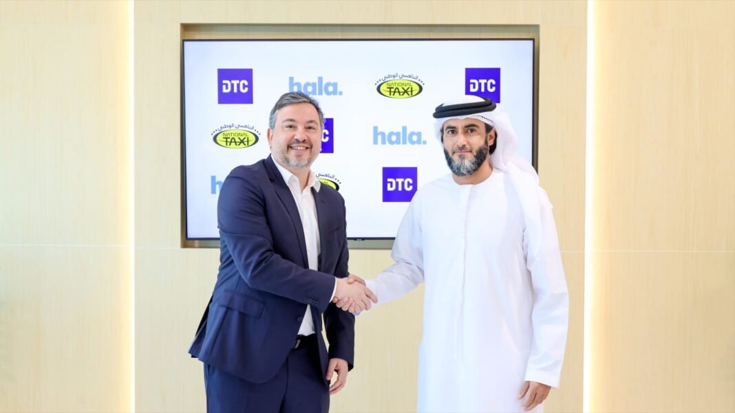 Two executives shake hands in front of a screen showing the DTC, Hala and National Taxi logos