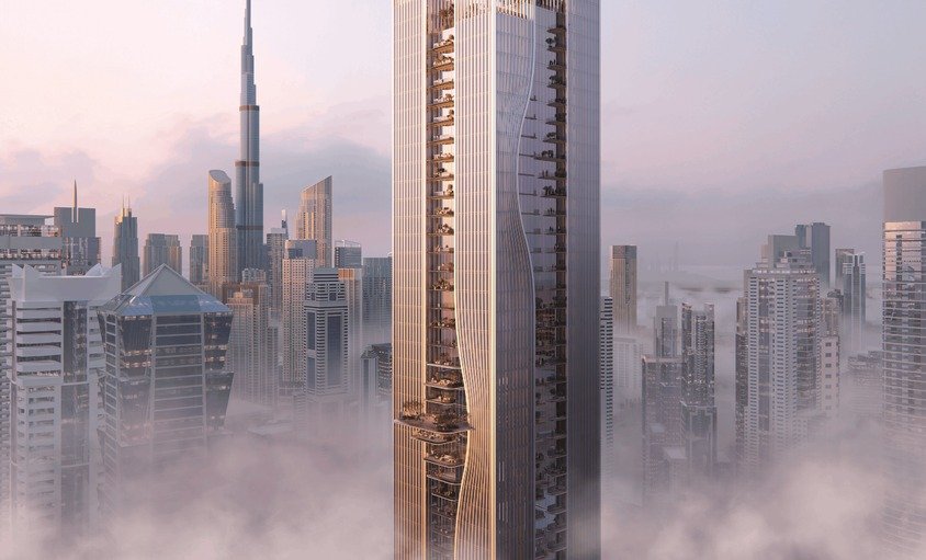 Rendering of a tall glass office tower with a curving facade rising above mist in Business Bay, with the Burj Khalifa in the background