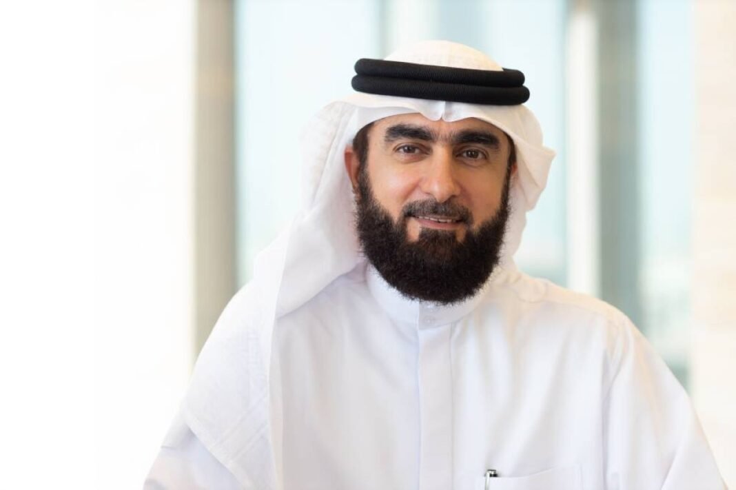 Portrait of Emirates Islamic Chief Executive Officer Farid AlMulla in a white kandura and ghutra