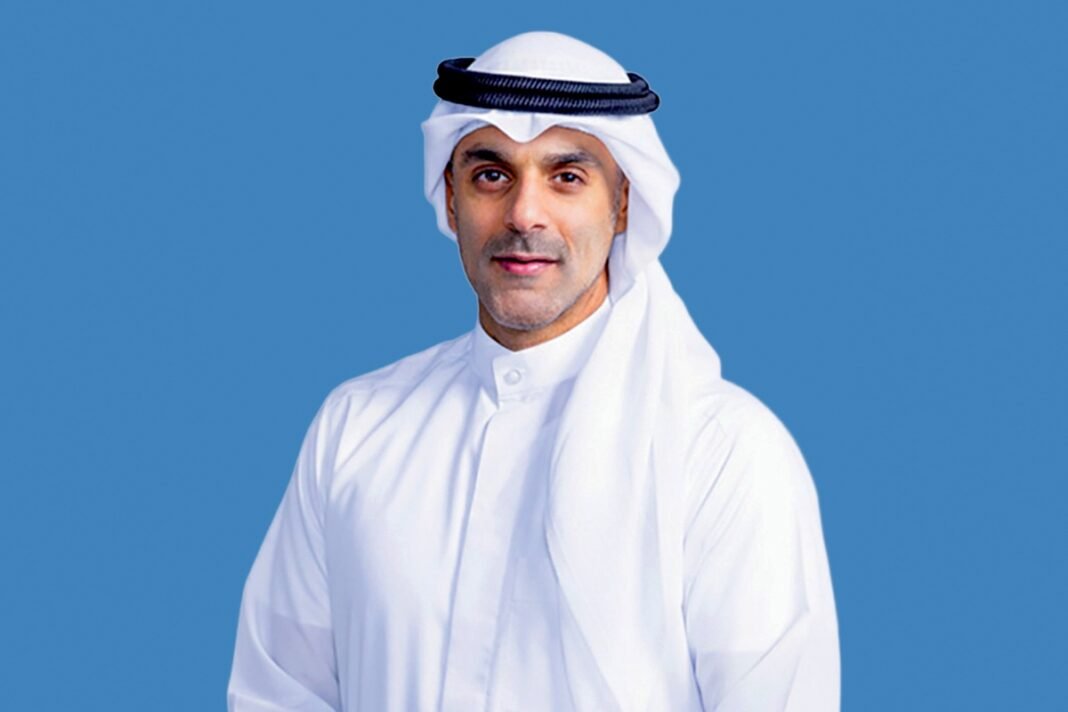Estate Capital Investment Company chairman Abdulaziz Al-Ghamlas in a white dishdasha and ghutra against a blue background