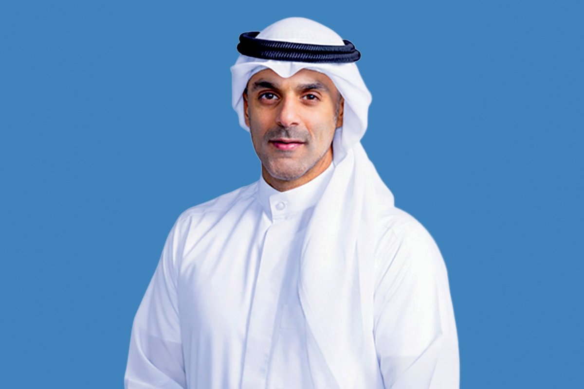 Estate Capital Investment Company chairman Abdulaziz Al-Ghamlas in a white dishdasha and ghutra against a blue background