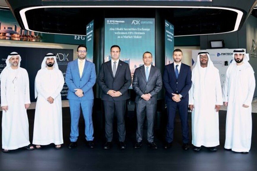 Executives from EFG Hermes and Abu Dhabi Securities Exchange at the launch of EFG Hermes UAE market making services on ADX