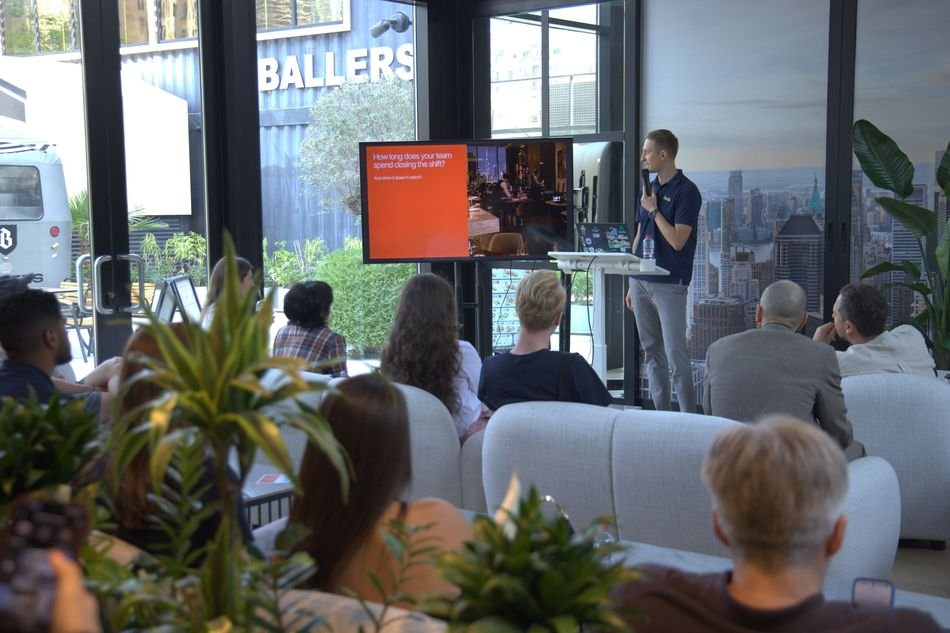 A Fortis presenter speaks to restaurant owners and guests at the FortisOS launch event at Ballers in Downtown Dubai
