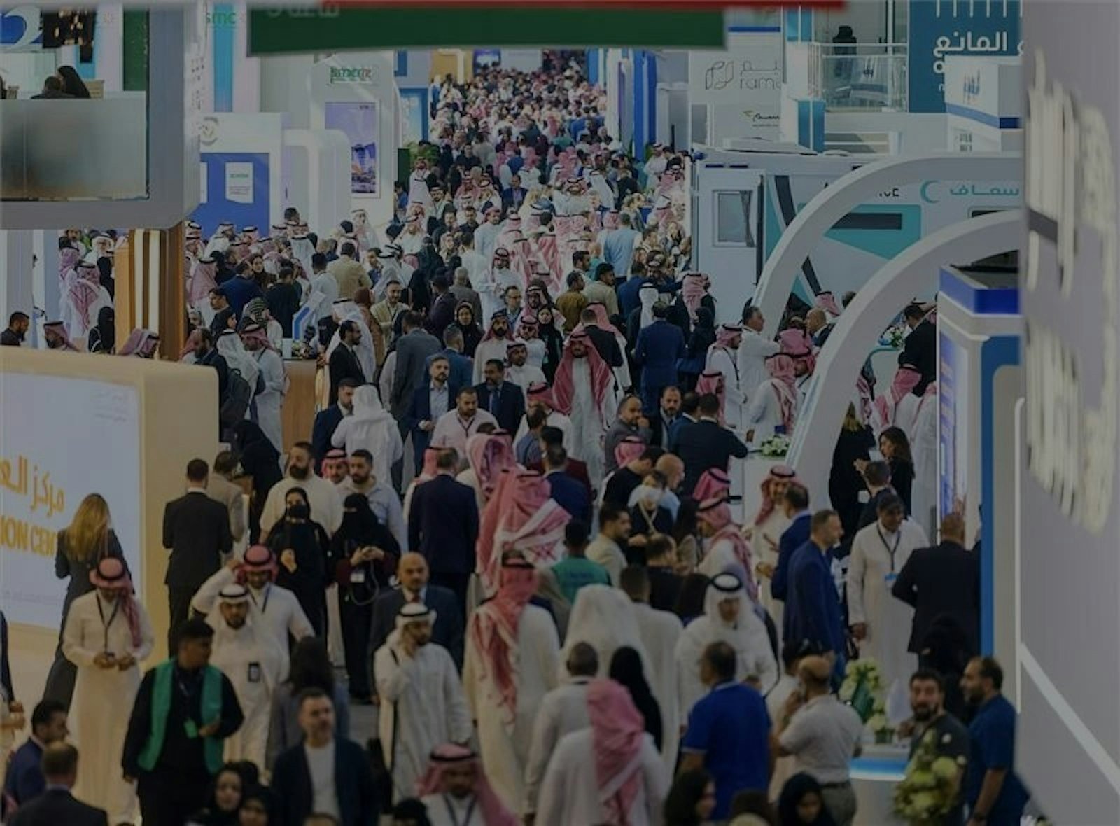 Visitors crowd an aisle at the Global Health Exhibition in Riyadh