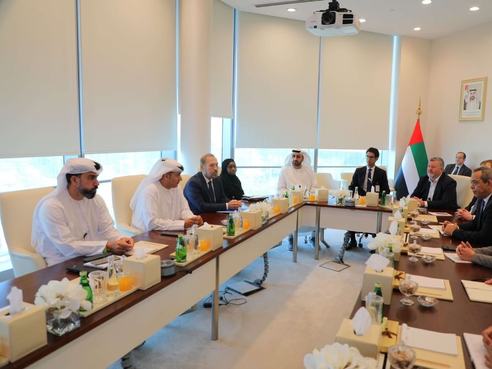 UAE officials and international experts seated at a conference table during a meeting on the IAEA mission to Barakah