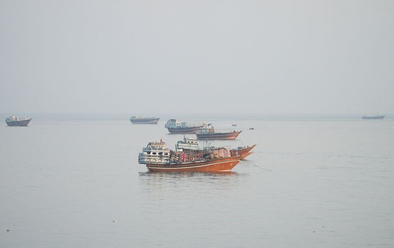 Vessels at anchor in the Strait of Hormuz, seen from Musandam, Oman