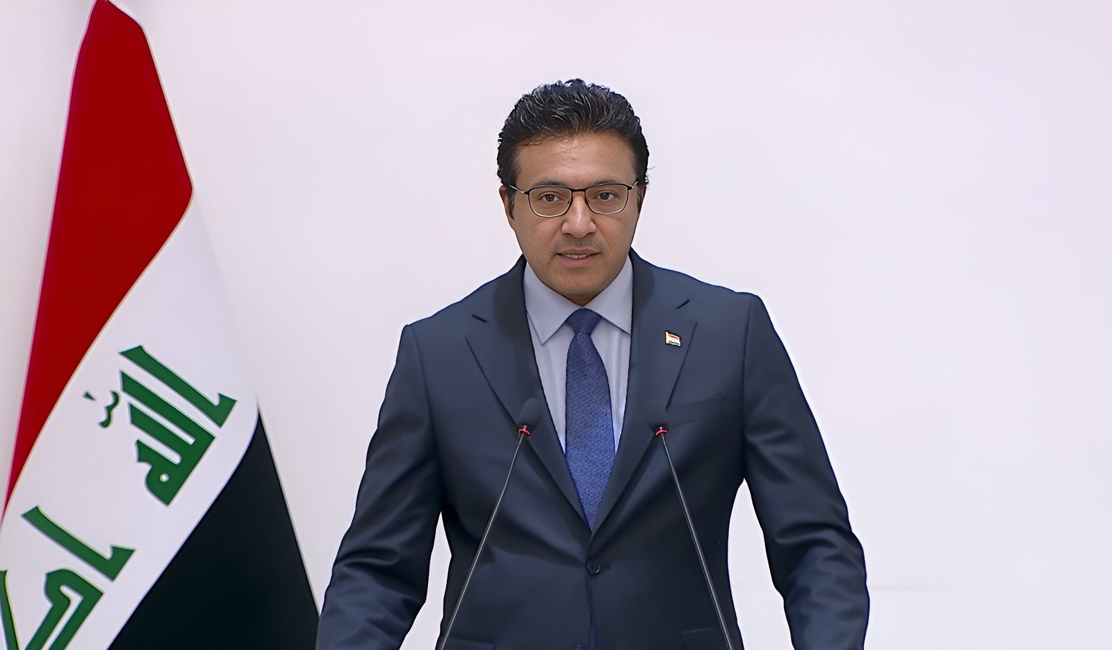 Iraqi government spokesperson Haider Al-Aboudi speaks at a news conference