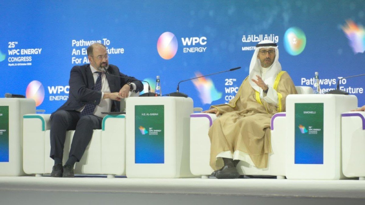 Two panelists seated on stage in front of WPC Energy Congress branding in Riyadh