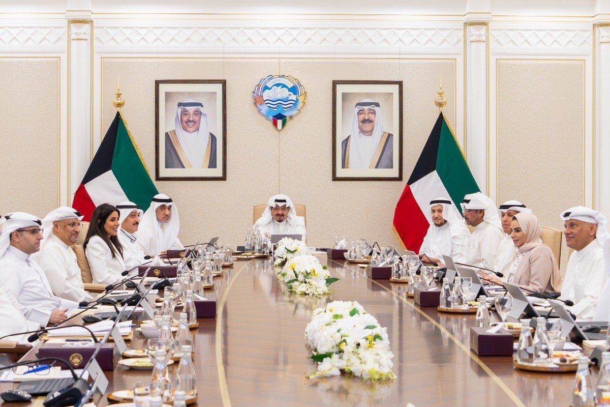 Kuwait's Cabinet in session around a long table in Kuwait City