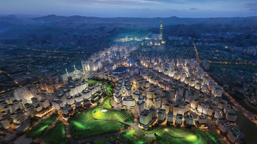 Artist's rendering of the Masar Destination development in Makkah at night, with dense towers, green parks and the Makkah Clock Royal Tower in the distance