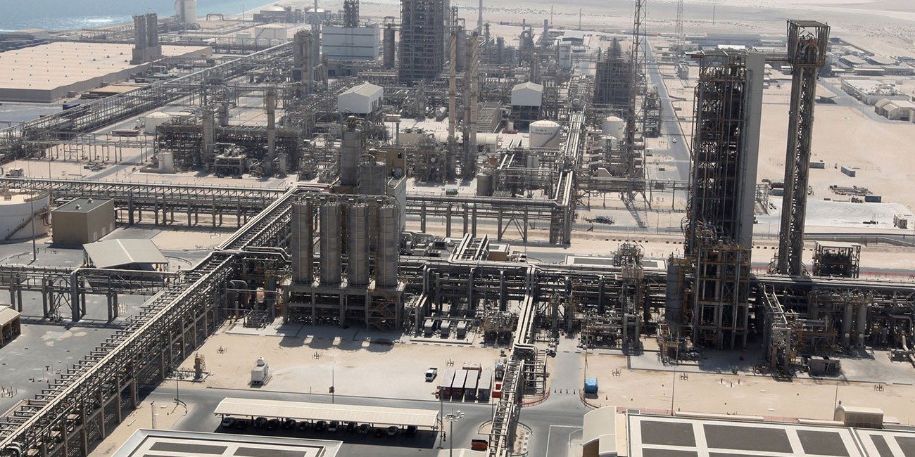 Aerial view of a petrochemical complex in Mesaieed Industrial City, Qatar