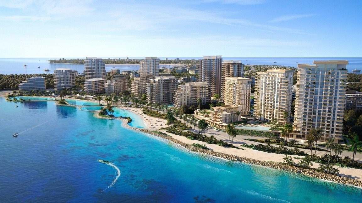 Artist's rendering of residential towers along a beachfront at Bay Grove Residences on Dubai Islands