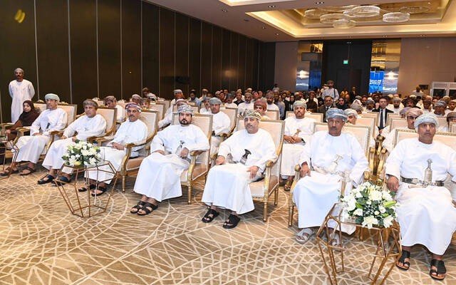 Guests seated at a ceremony for the signing of investment agreements in Oman's economic zones