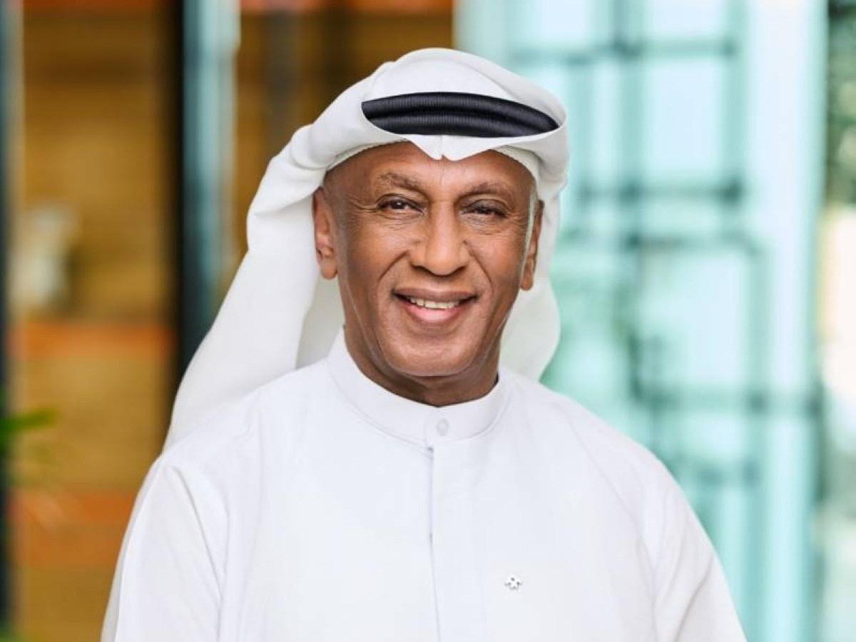 Omer Elamin, President of Orient Insurance Group, smiling in a white kandura and ghutra
