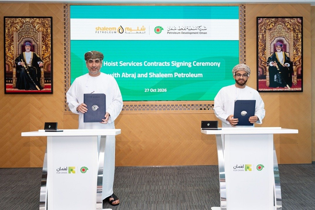Officials from Petroleum Development Oman and Shaleem Petroleum hold signed contracts at a ceremony