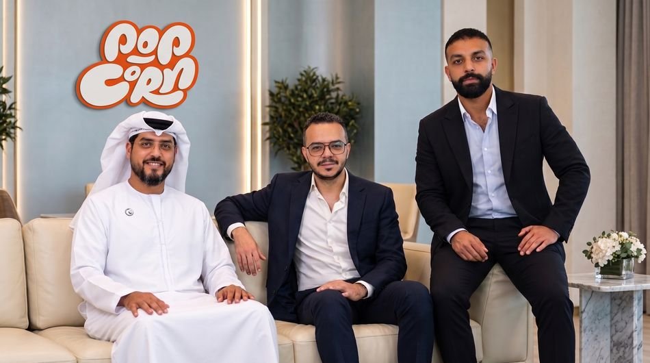 Popcorn AI Studio co-founders and lead investor seated in front of the company's logo