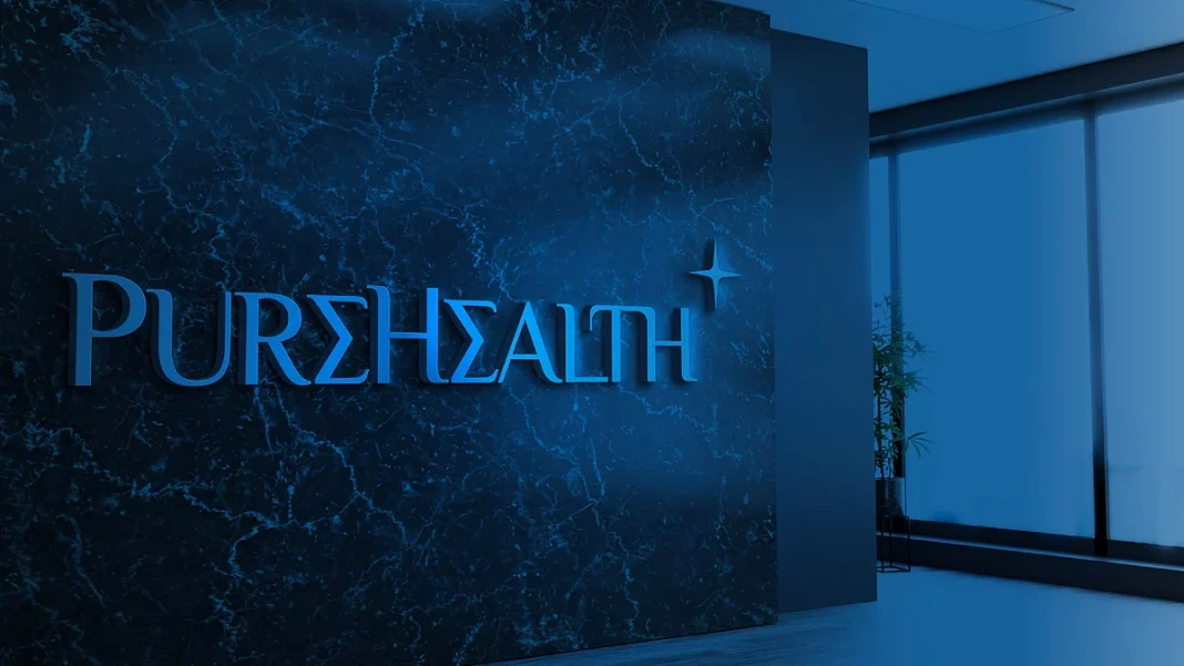 PureHealth sign on a marble wall in a company office