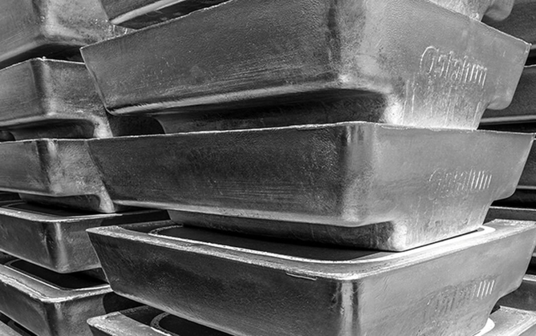 Stacked aluminum sow ingots stamped with the Qatalum name