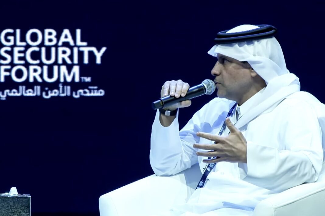 Sheikh Saoud bin Abdulrahman Al Thani speaking into a microphone on stage at the Global Security Forum in Doha