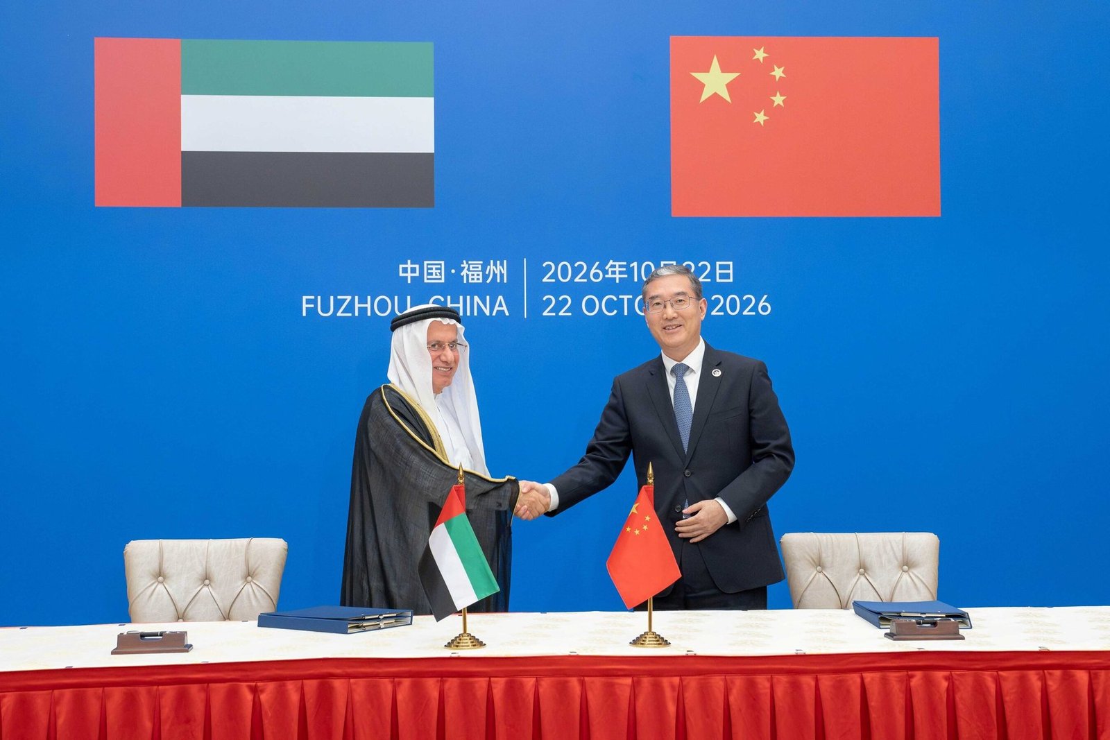 Mohamed Omran Al Shamsi and Fujian Vice Governor Zhao Zenglian shake hands at the signing of the Ras Al Khaimah and Fujian friendship agreement in Fuzhou