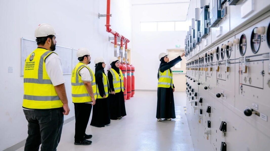 Sharjah Electricity, Water and Gas Authority engineers inspect switchgear inside a distribution substation