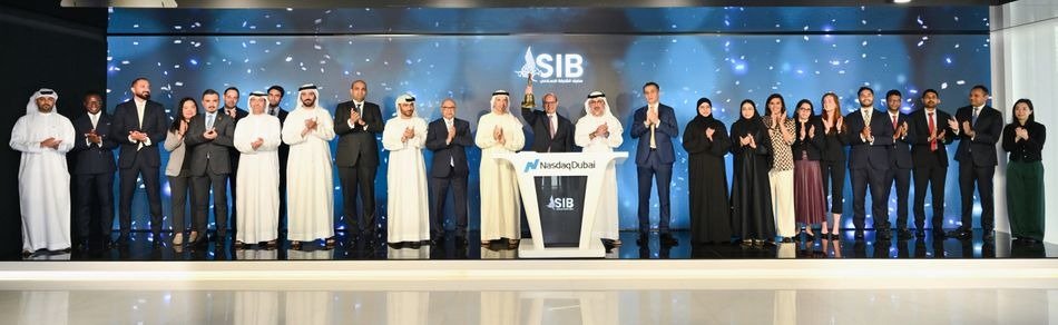 Sharjah Islamic Bank and Nasdaq Dubai officials at the bell ringing ceremony