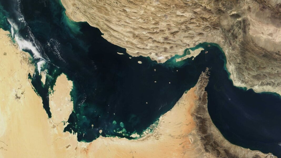 Satellite view of the Strait of Hormuz between the Arabian Peninsula and Iran, with the Musandam Peninsula at center